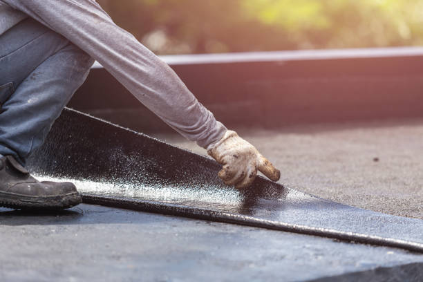 Professional Basement Waterproofing technician working in Mulga, AL